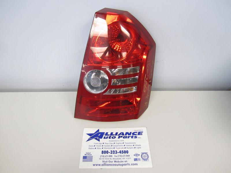 08 09 10 chrysler 300 r. tail light base and touring