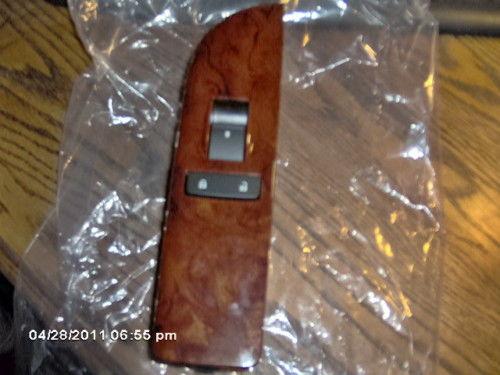 New gm oem wood passenger / right door switch