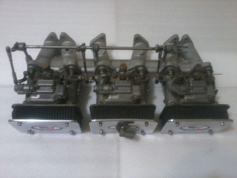 Dellorto 40's  triple carburators with manifold,linkage and filrters.complete 