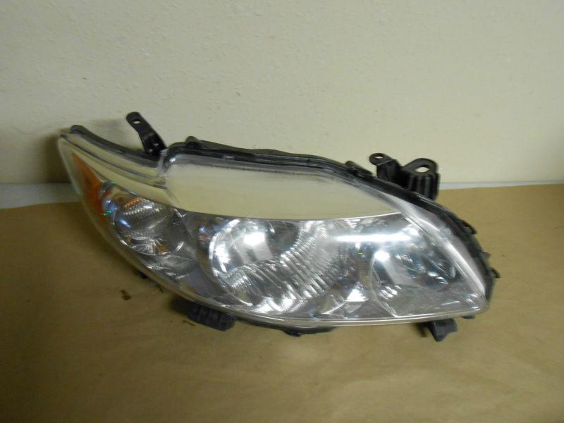 2009,09,10,toyota corolla  right passenger headlight oem free shipping