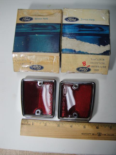 70/77 bronco 70/72 f100 ford pickup reflectors - red - with  bezel - pair - nos