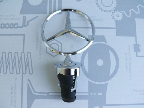 Genuine mercedes hood star emblem for w124 200e - 500e nos! original packaging