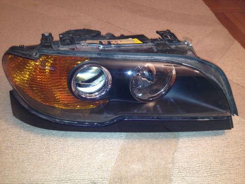 2004-2006 oem  bmw 330 ci right headlight.