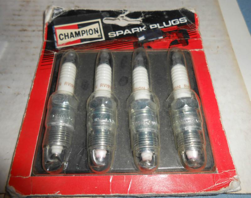 Lot of 4 champion rv19yc6 spark plugs