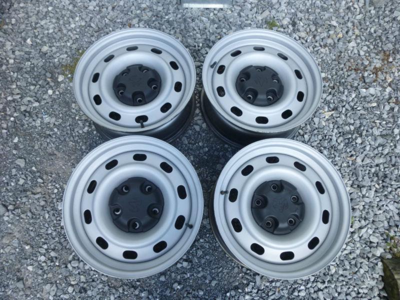 Set of 4 used 17" dodge ram 1500 steel 5 lug wheels rims 2002-2012