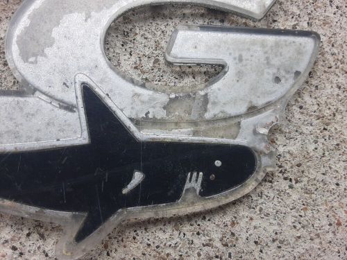 Two vintage mfg side boat emblems  chrome plastic shark &amp; letters emblems broken