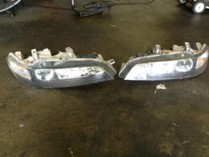 94-01 acura integra jdm front headlights black housing non-hid oem (pair)