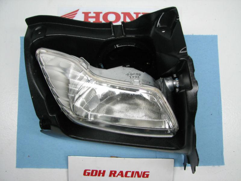 2007 rancher 420 right headlight lens and housing stock  