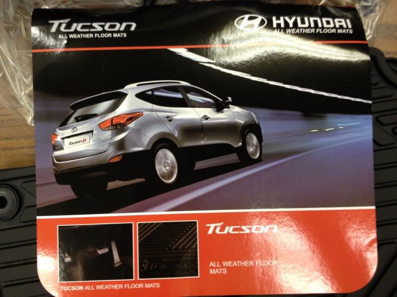 4 piece set -- 2010 to 2013 hyundai tucson rubber floor mats - factory oem items