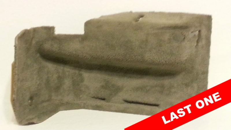 Used right side gray carpeted rear cover panel for a 97-04 corvette