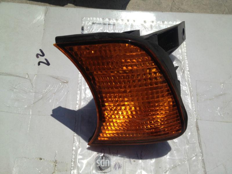 Used oem bmw e34 amber turn signal corner lamps left and right