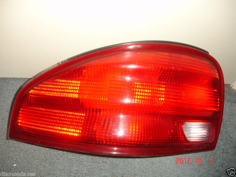 1996 dodge stratus left tail light assembly- ex. condition!!!!