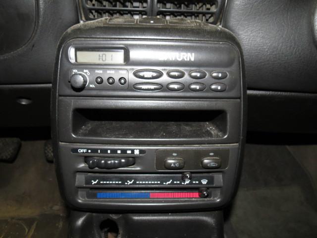 1998 saturn s series sedan radio trim dash bezel 2571138
