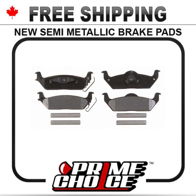 New premium complete set of rear metallic disc brake pads with shims