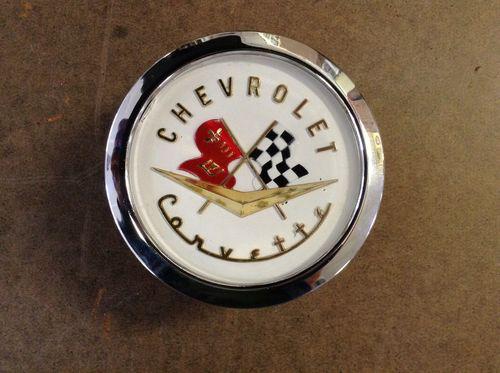 1956-1957 corvette nose and trunk emblem with bezel, car set