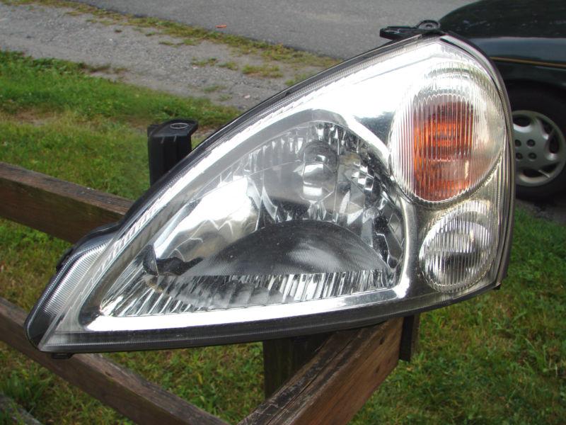 2002 03 04 05 06 07 aerio headlight complete lh