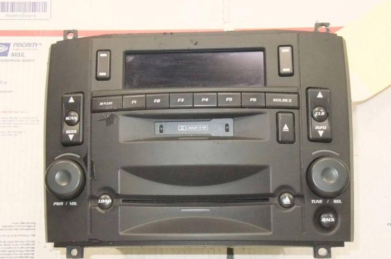 Radio am-fm cd+cassette cadillac cts/srx 2003 2004 2005 2006 2007 25753339 oem