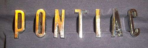 1950s 60s? vintage nos pontiac emblem letters 519494 519500,519499,519498,519497