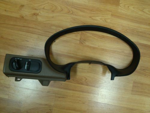 Oem 1998 concorde dash speedometer trim bezel with head light switch