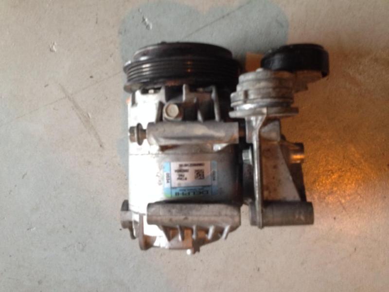 C6 corvette a/c compressor and braket with tensioner.used in great working condi