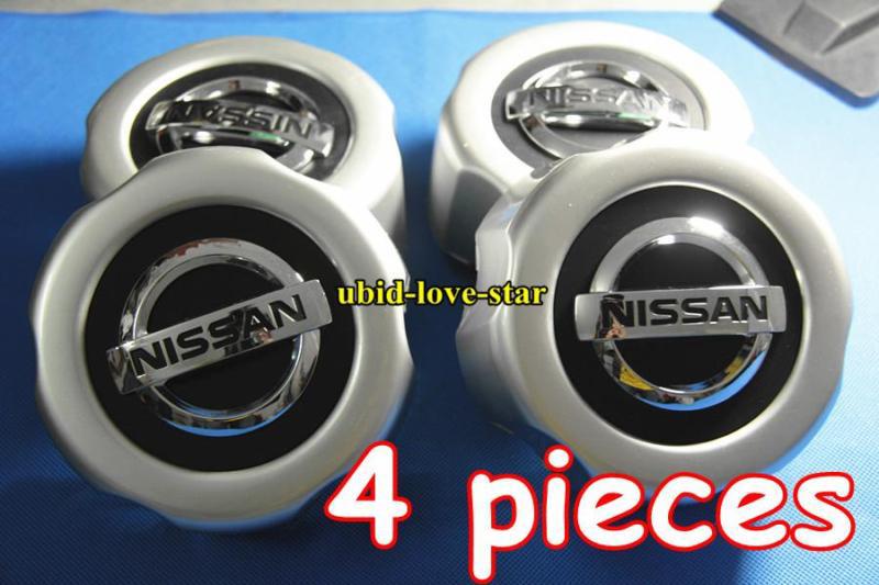 Set nissan emblem wheel hub center caps 1996 to 99 pathfinder xterra 40315-89p15