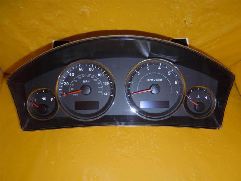 06 commander speedometer instrument cluster dash panel gauges 65,731