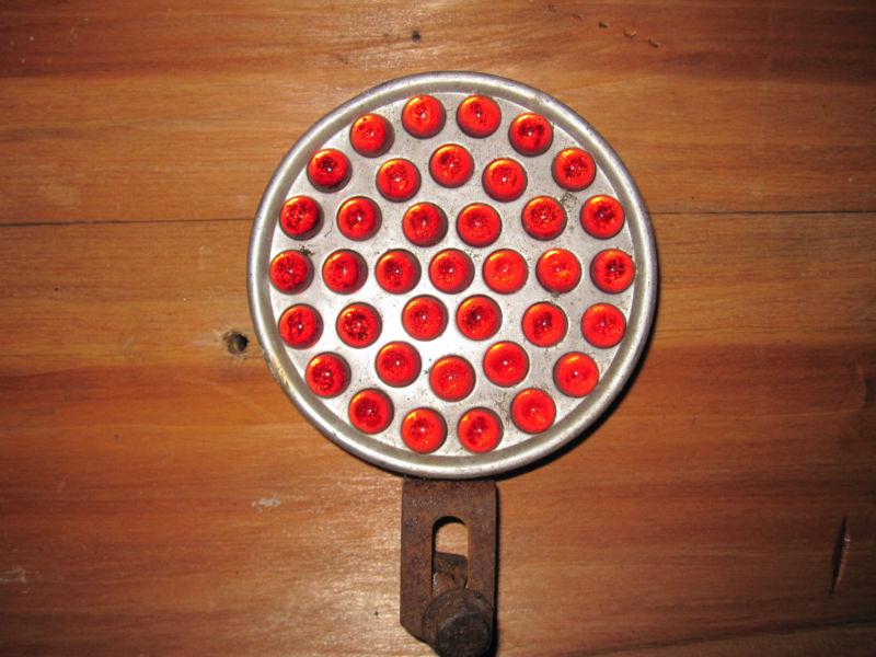  antique persons # 337 marble style red reflector bicycle or auto 1930's