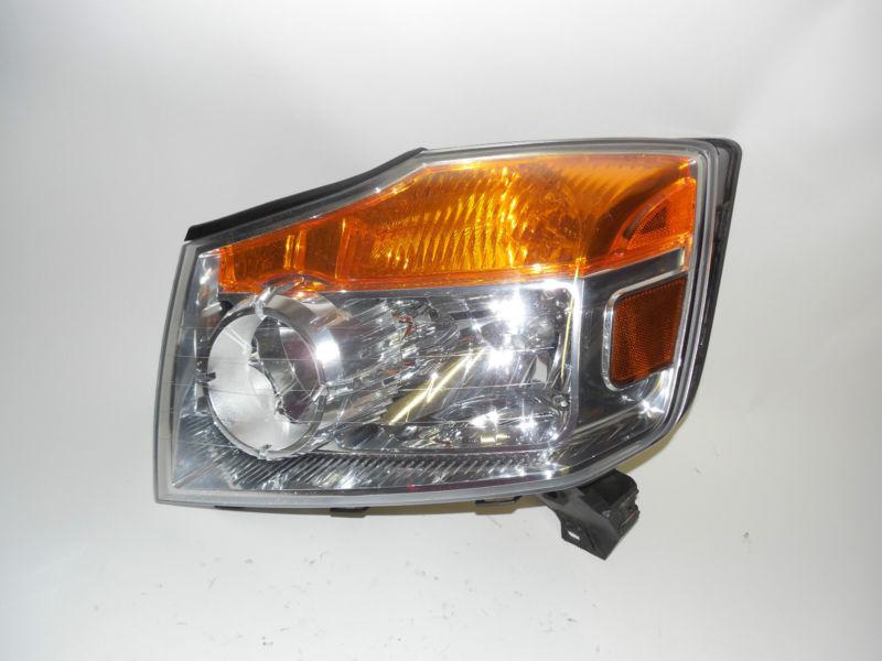 08 09 2010 2011 2012 nissan armada oem left headlight nice!