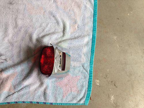 Harley dyna tail light and chrome cover