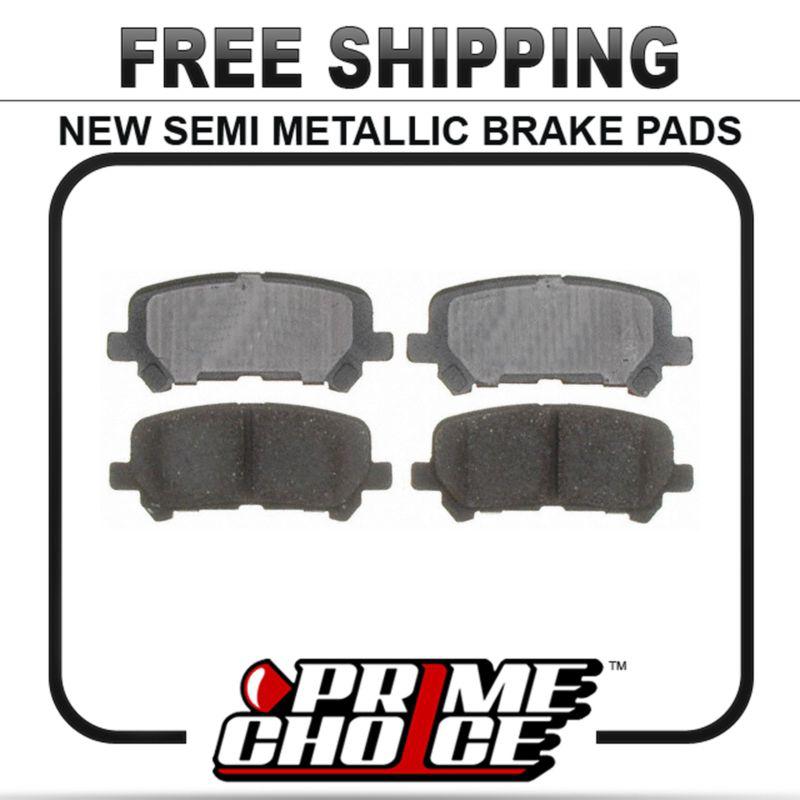 New premium complete set of rear metallic disc brake pads with shims