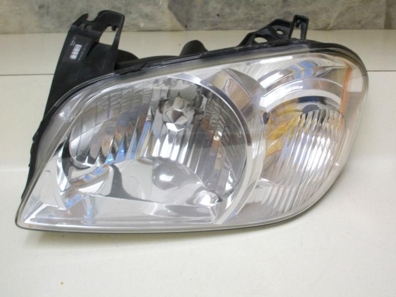 Mazda tribute 05 06 headlight oem orignal lh factory genuine