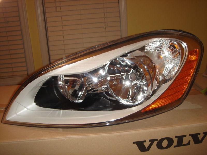 2010-2012 volvo xc60 headlight left side with bulbs 