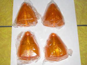 4-new orange triangular light covers for trailers/trucks/tractors or other