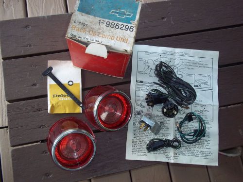 Nos vtg. back-up lamp unit set- 1965 chevy impala - 1#986296, gr.2.697