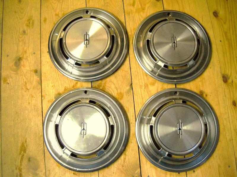 Hub caps wheel covers 70 olds f-85 maybe cutlass 14 inch set of 4