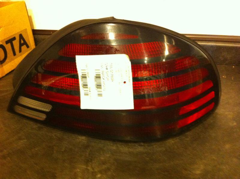  99 00 01 02 03 04 05 grand am r. tail light qtr mtd se 