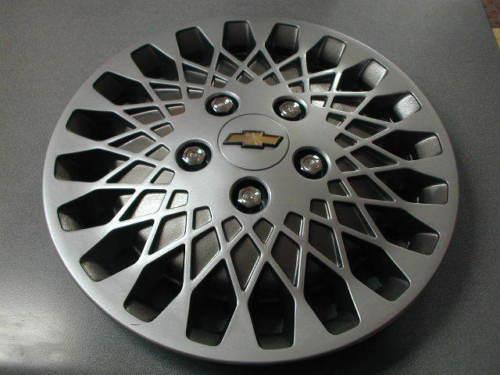 Chevrolet oem 14" wheel cover hubcap set new in original boxes