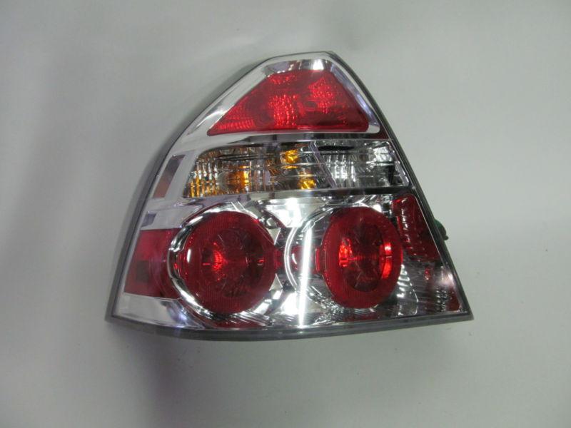 09 2010 2011 chevrolet aveo sedan oem left tail light nice!