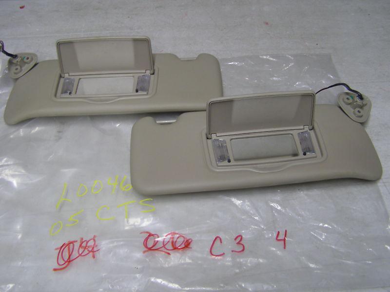 2005 cadillac cts sun visors sunvisors  tan  vinyl  oem