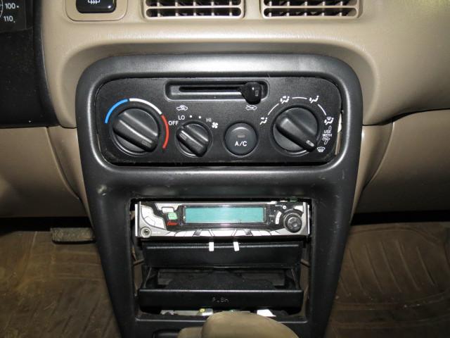 1999 chevy prizm radio trim dash bezel 2590426