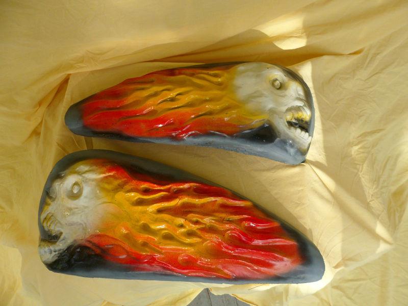Screaming, flaming demon gas tank sculptures for harley sportster