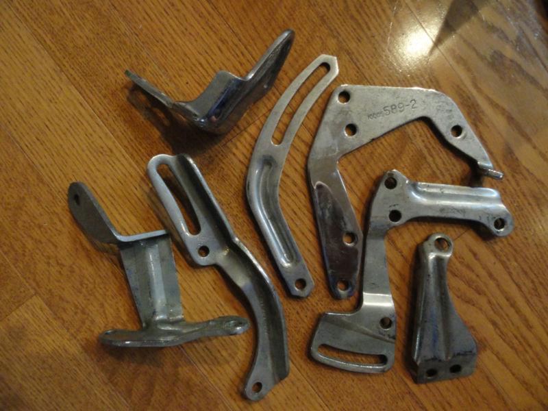 Assorted chrome engine brackets