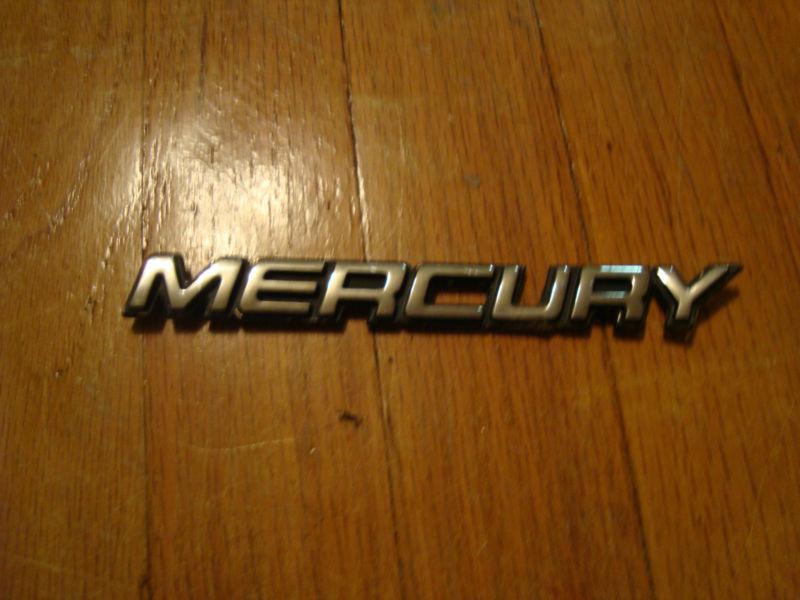 Used chrome plastic mercury emblem nameplate