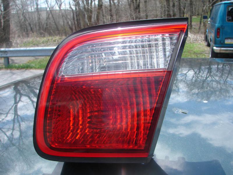 1999 00 millenia tail light inner trunk lid mounted rh