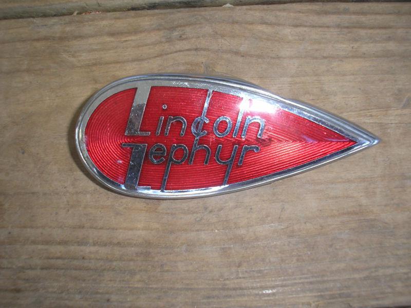 1938 lincoln zephyr emblem, original left side