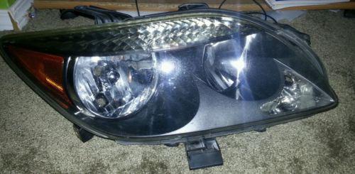 2006 scion tc oem l/r projector style headlight nice!