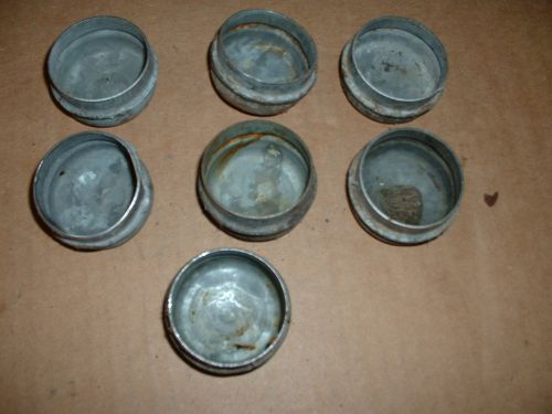 Fiat 850 dust caps for front wheel hubs, protect bearings.