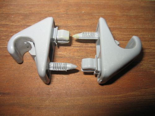 1997 -2000 lexus gs 300 oem gray  clip hooks (2) with screws