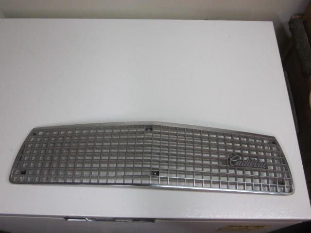 Front grille for 1987 cadillac cimarron, includes "cadillac" emblem