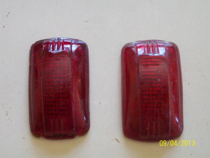 A pair of nos tail lens  for a 1940 plymouth  